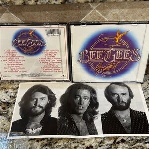 Greatest Hits CD - Purple and Gold